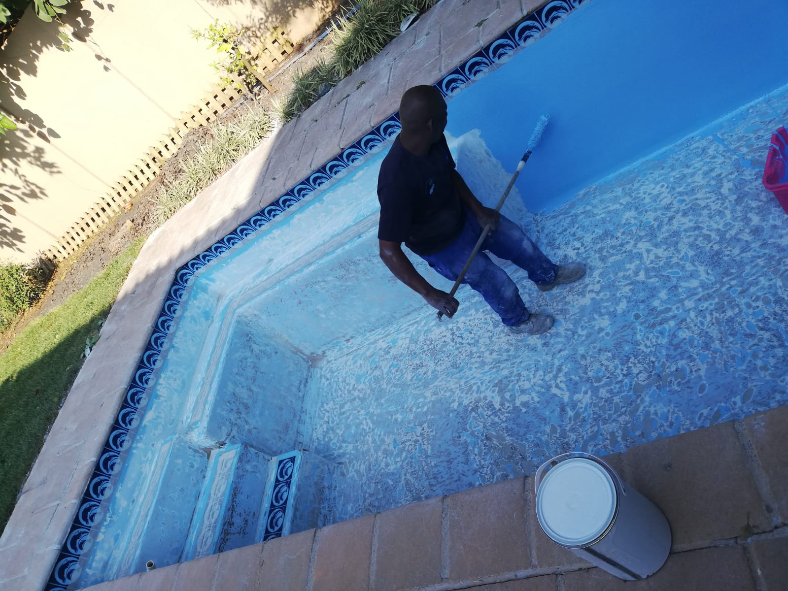 Pool painting and recoating in progress